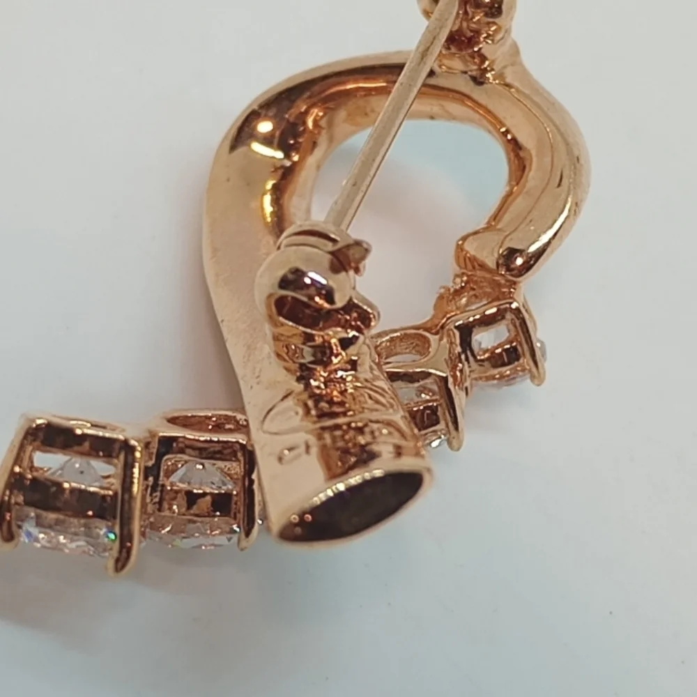 * Kenneth Jay Lane Rose Gold Tone Breast Cancer Ribbon Pin Brooch